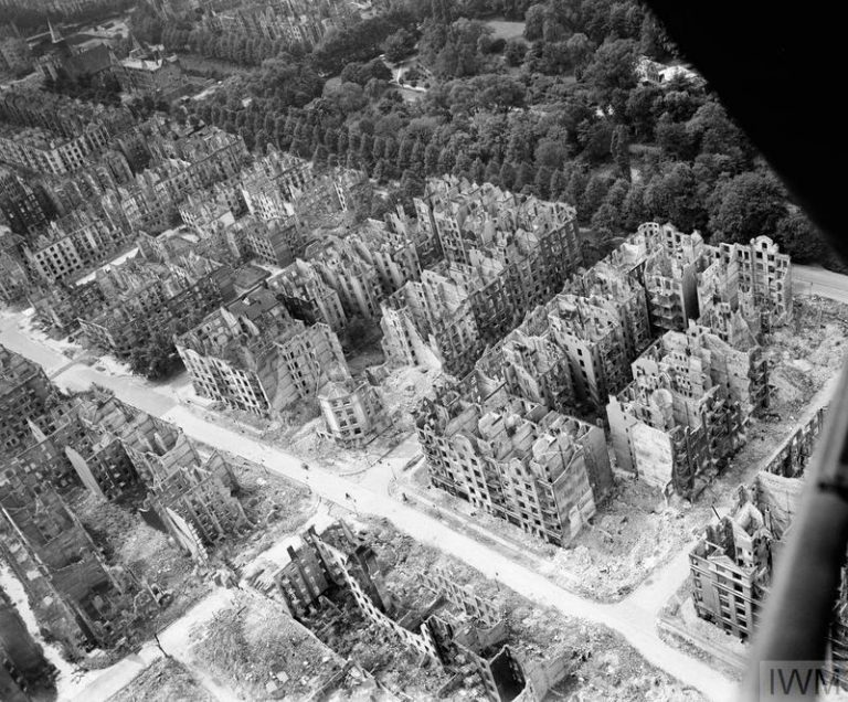 ROYAL AIR FORCE BOMBER COMMAND, 1942-1945. (CL 3400) Oblique aerial view of ruined residential and commercial buildings south of the Stadtpark (seen at upper right) in the Eilbek district of Hamburg, Germany. These were among the 16,000 multi-storeyed apartment buildings destroyed by the firestorm which developed during the raid by Bomber Command on the night of 27/28 July 1943 (Operation GOMORRAH). The road running diagonally from upper left to low... Copyright: © IWM. Original Source: http://www.iwm.org.uk/collections/item/object/205023601